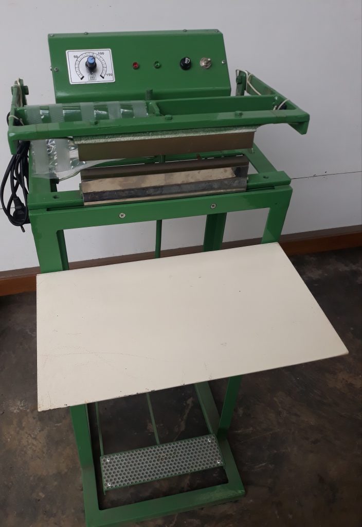 Alat Pengemas manual